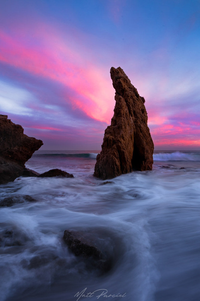 El Matador Beach in Malibu with dramatic sea stacks, caves, and rock formations along the California coast